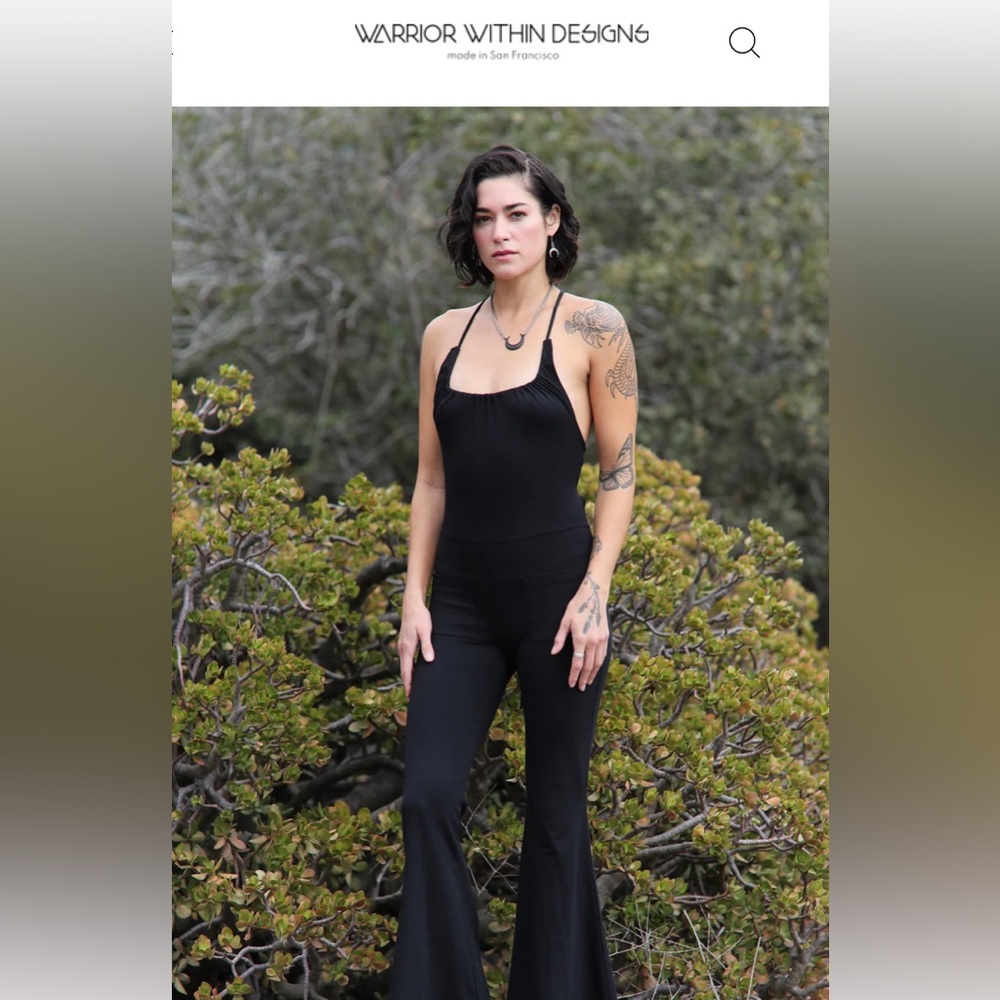Warrior Within Designs : Bell Onesie. Black. New. Never worn.